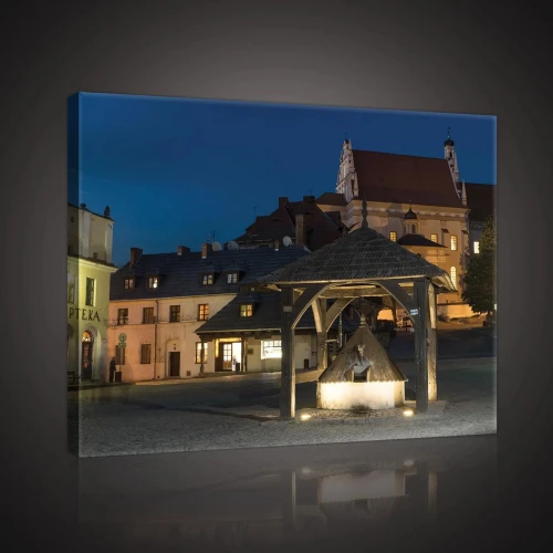 Obraz na płótnie obraz na ścianę granatowy złoty rynek studnia